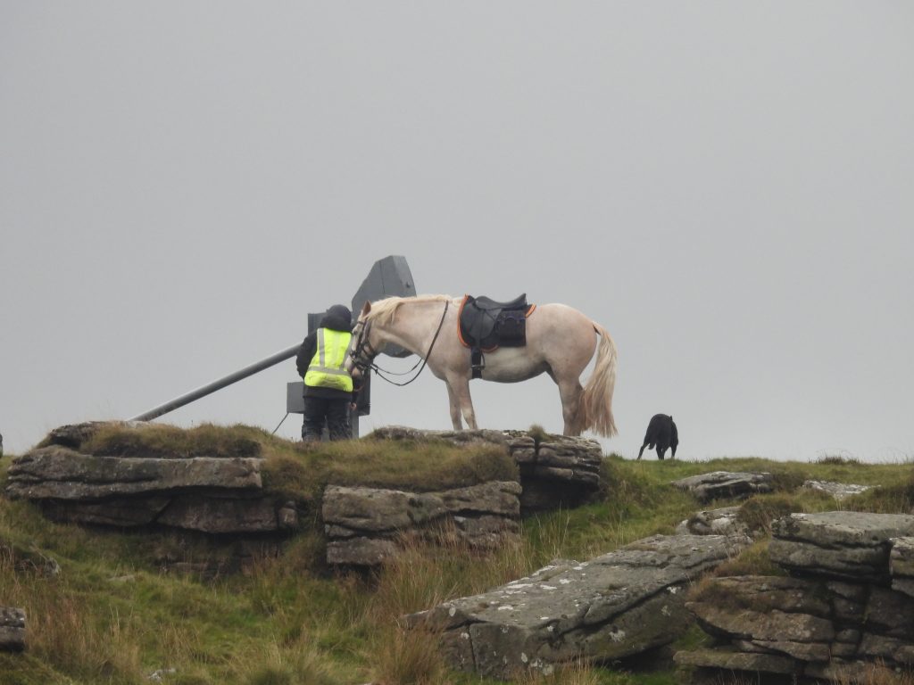 37. Taking down flag at Doe Tor